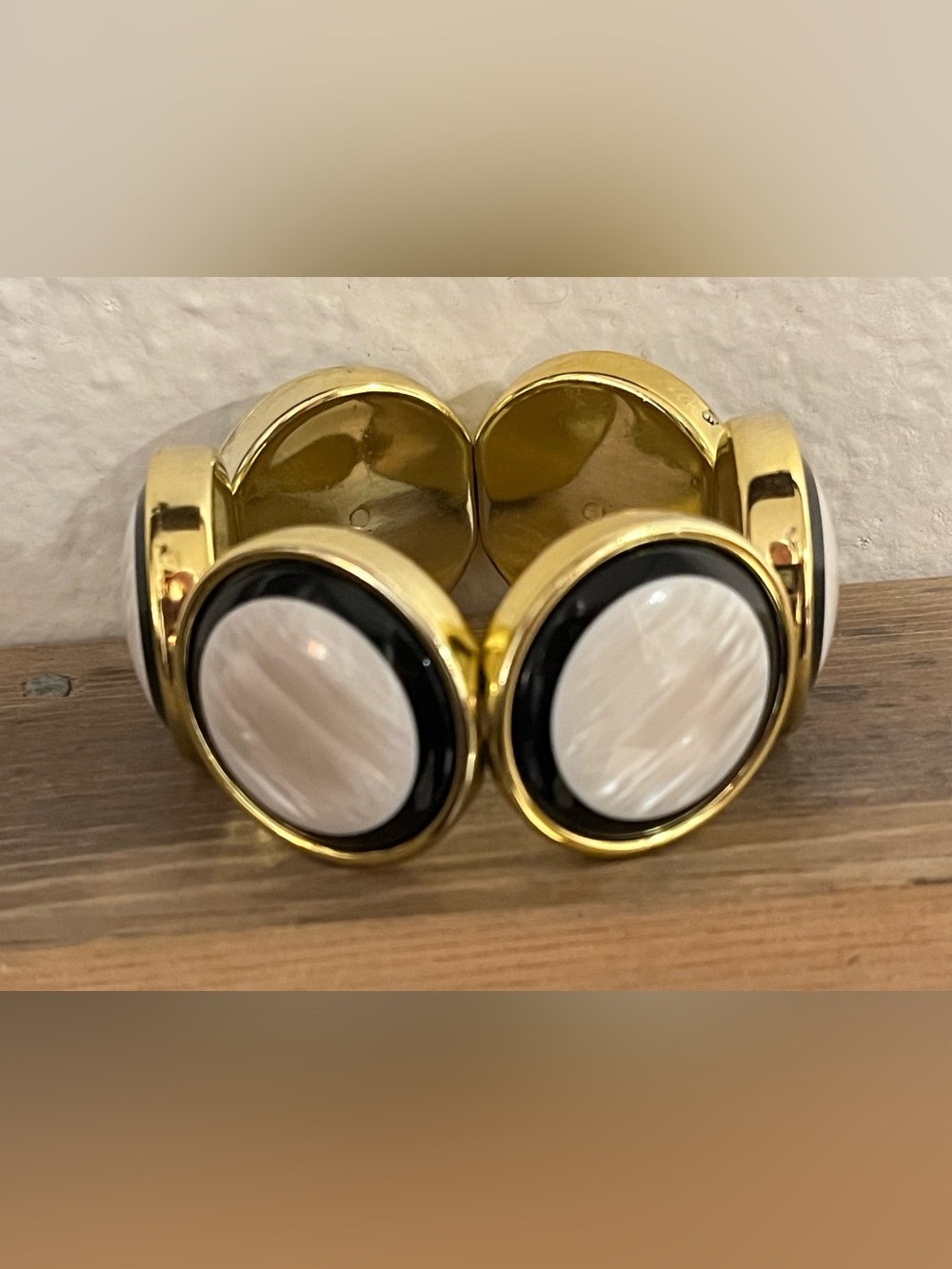 Gold Tone Black and Cream Round stretch bracelet